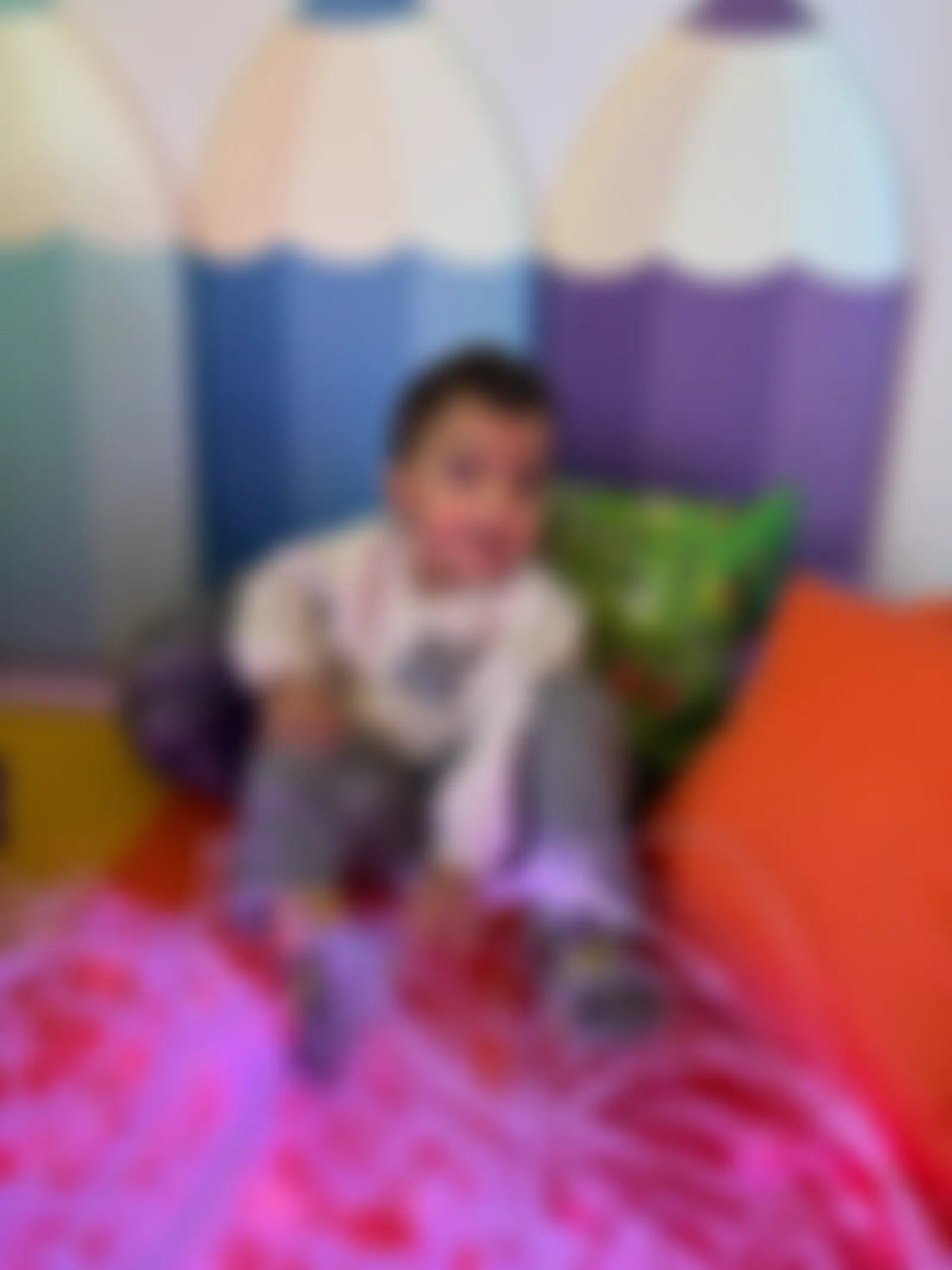 Child relaxing in the fibre-optic sensory den